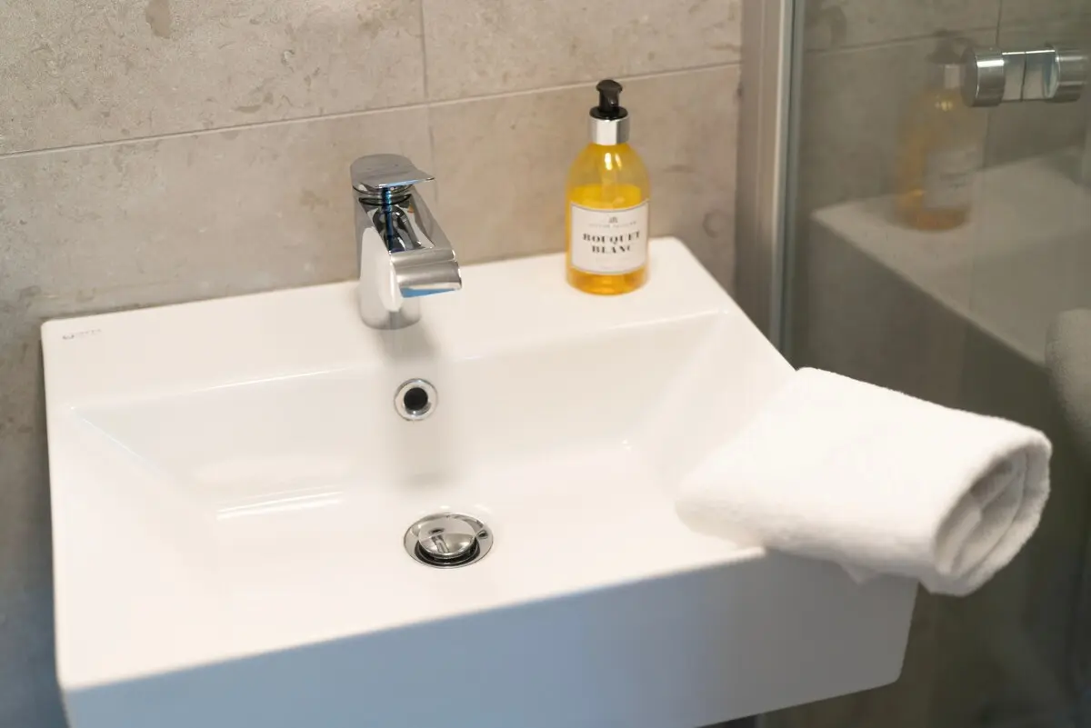 Bathroom with shower and floor heating