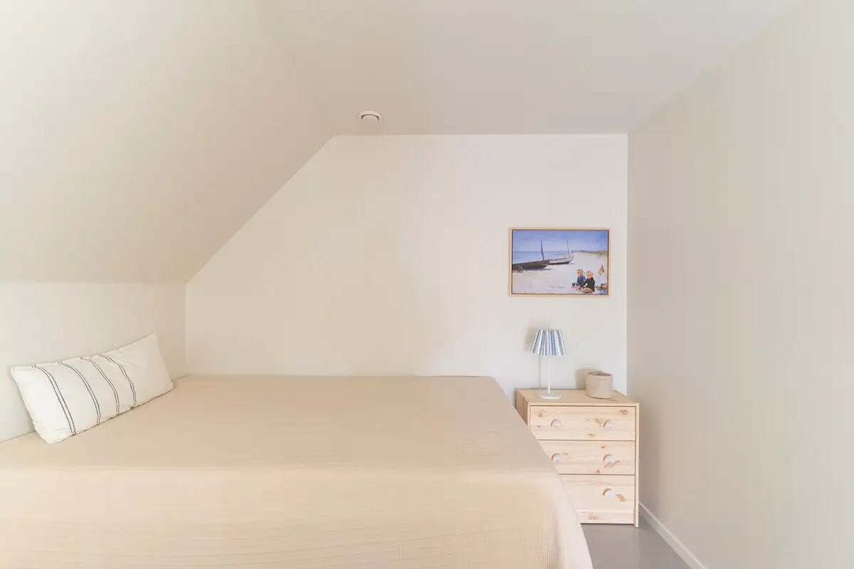 Sleeping alcove with built-in bed