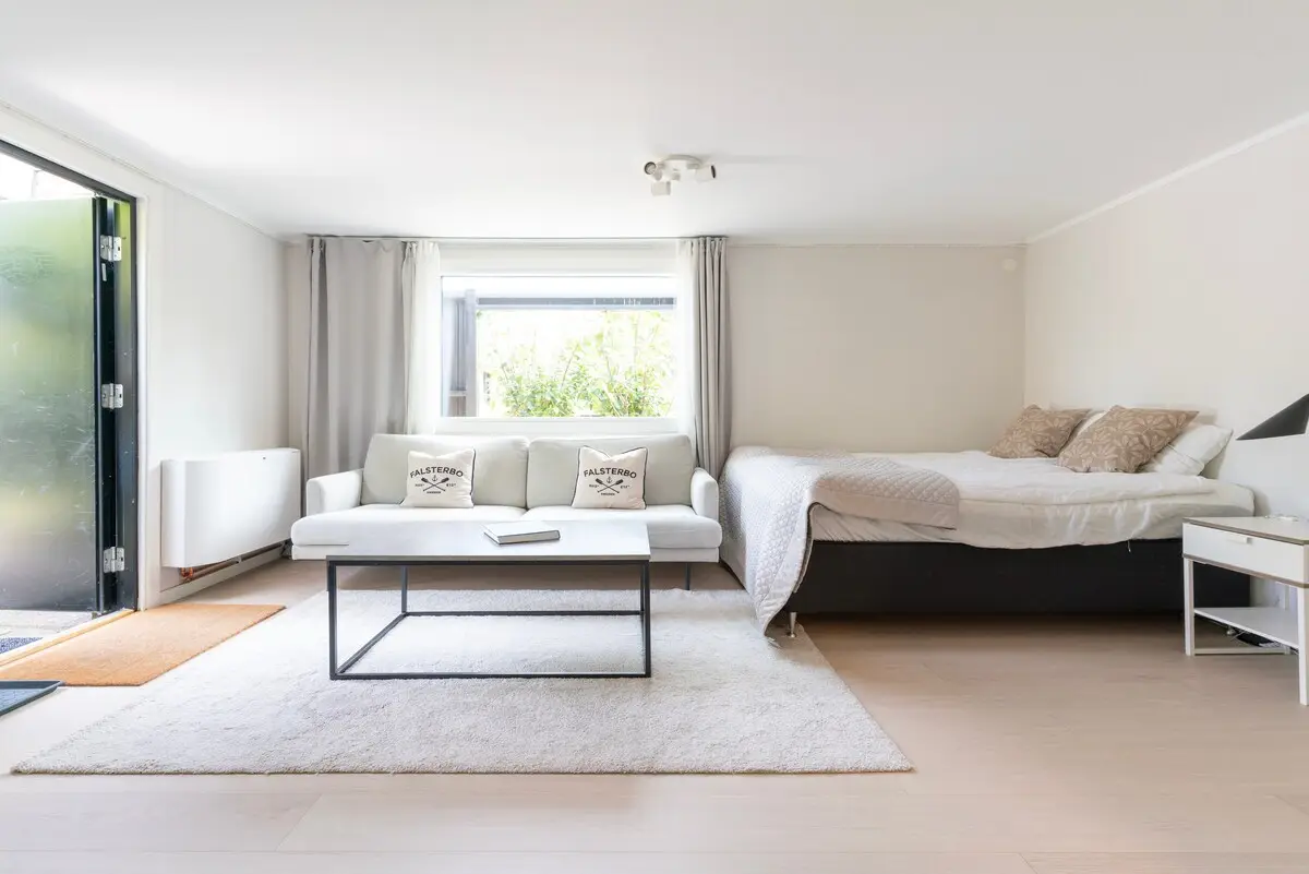 Bedroom with bedside table and lamp