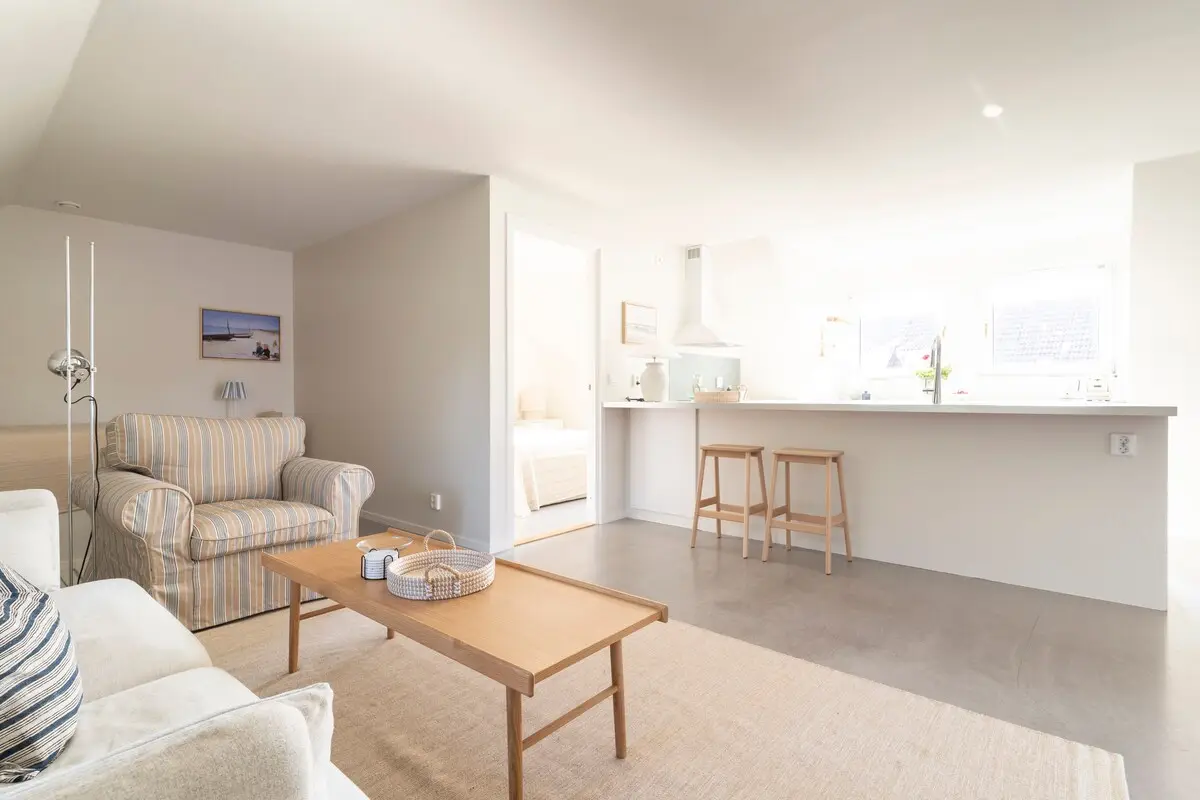 Bright, carefully prepared living room in a FalsterboStay home
